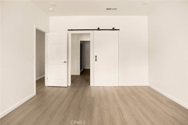 13990 Pineland Cir, Magalia, CA 95954 - unfurnished bedroom featuring light wood finished floors and baseboards