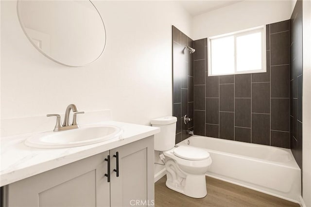13990 Pineland Cir, Magalia, CA 95954 - full bathroom with vanity, wood finished floors, toilet, and shower / bath combination