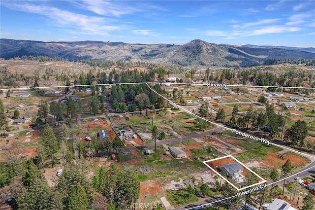 13990 Pineland Cir, Magalia, CA 95954 - aerial view of property and surrounding area with property boundaries highlighted and mountains