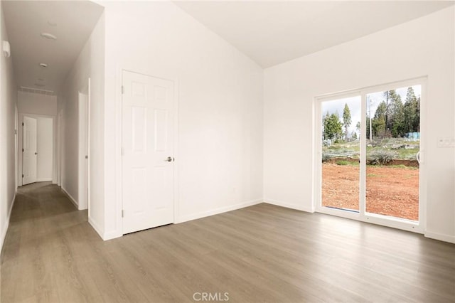 13990 Pineland Cir, Magalia, CA 95954 - spare room with wood finished floors and baseboards