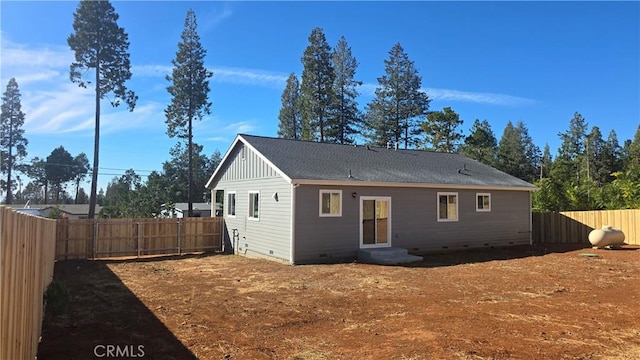 13990 Pineland Cir, Magalia, CA 95954 - back of property featuring a fenced backyard and crawl space