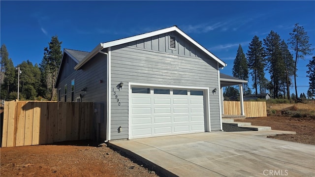 view of property exterior with a garage
