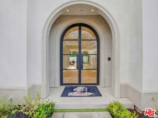 entrance to property with french doors