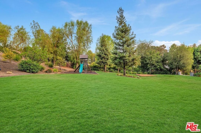 view of yard featuring a playground