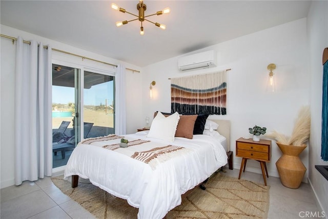 tiled bedroom with access to outside, a wall unit AC, and a chandelier