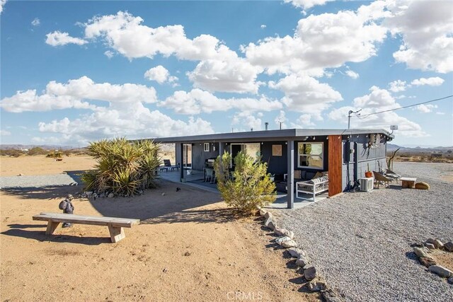 view of front of home featuring a patio area