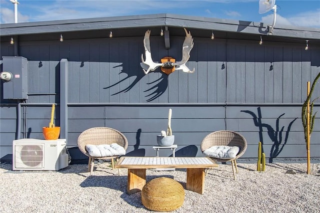 view of patio featuring ac unit