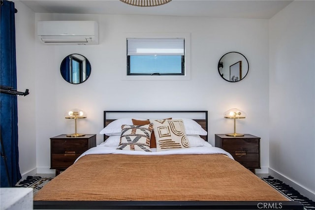 bedroom with a wall mounted air conditioner