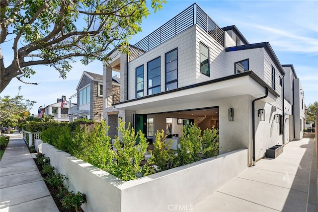 view of side of property featuring a garage