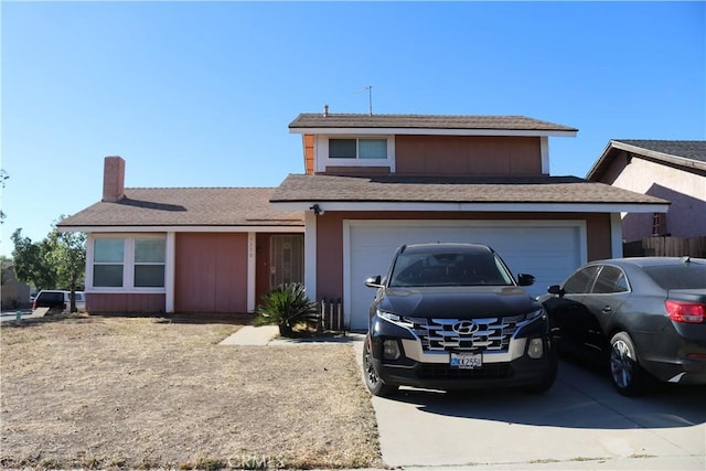 front of property featuring a garage