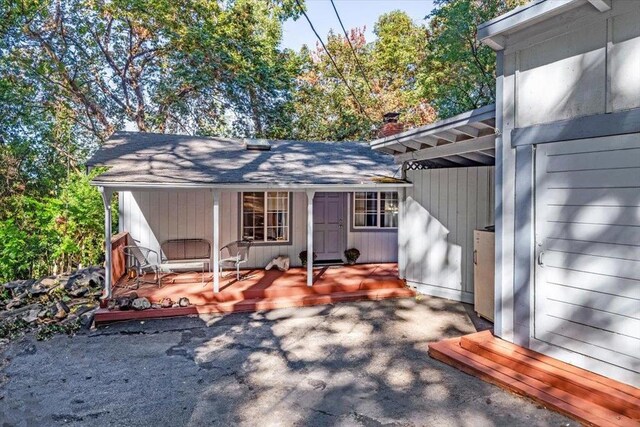 exterior space featuring a wooden deck