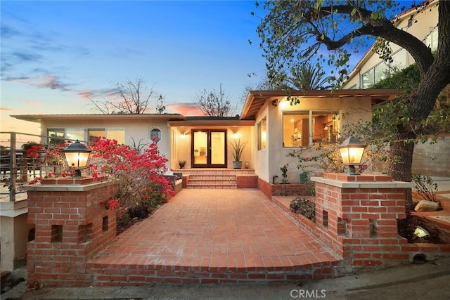 view of front facade with a patio