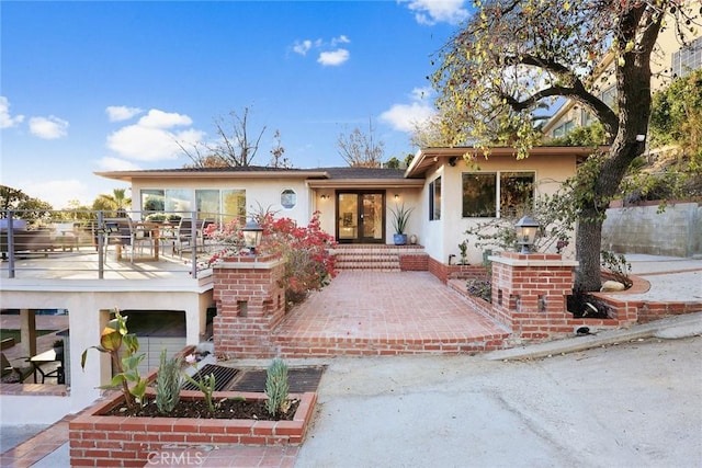 view of front of house with a patio area