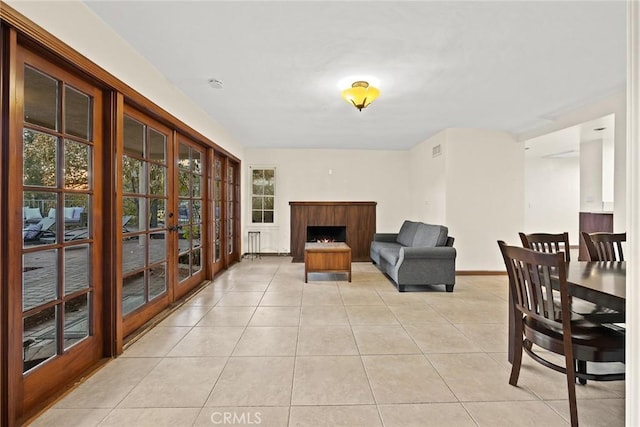 tiled living room with french doors