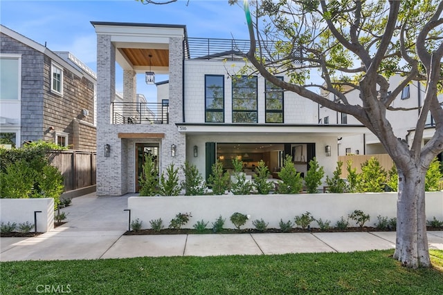 contemporary house with a balcony