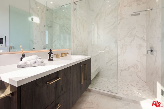 bathroom with vanity and an enclosed shower