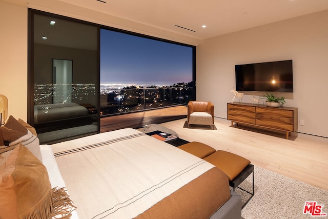 bedroom featuring wood-type flooring