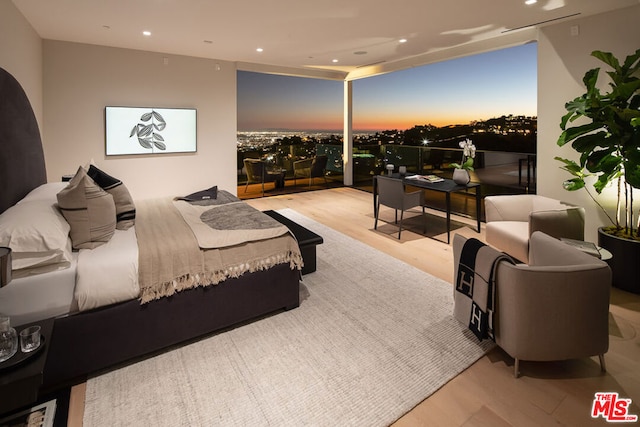 bedroom with light hardwood / wood-style flooring