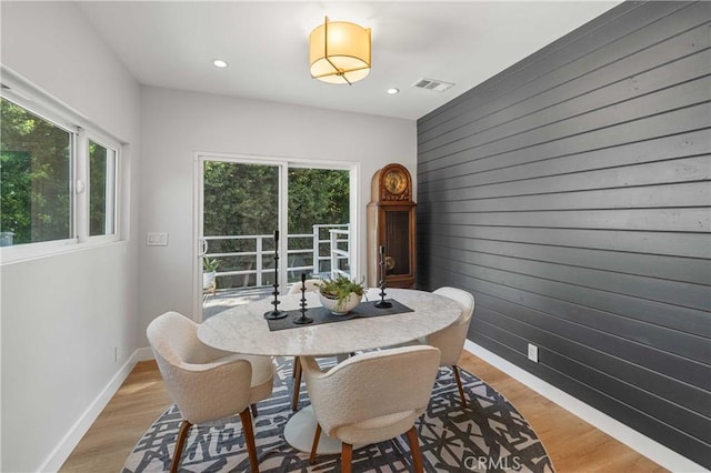 dining room with light hardwood / wood-style flooring