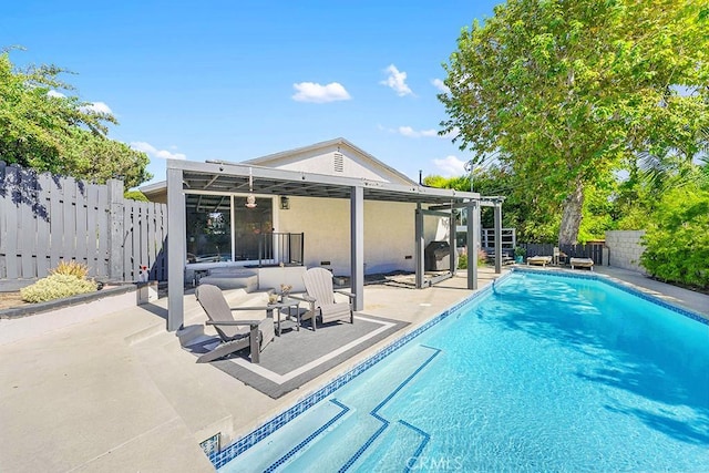 view of pool featuring a patio