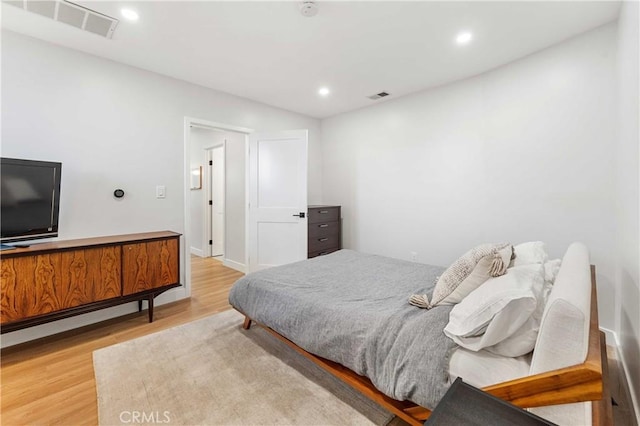 bedroom featuring hardwood / wood-style flooring