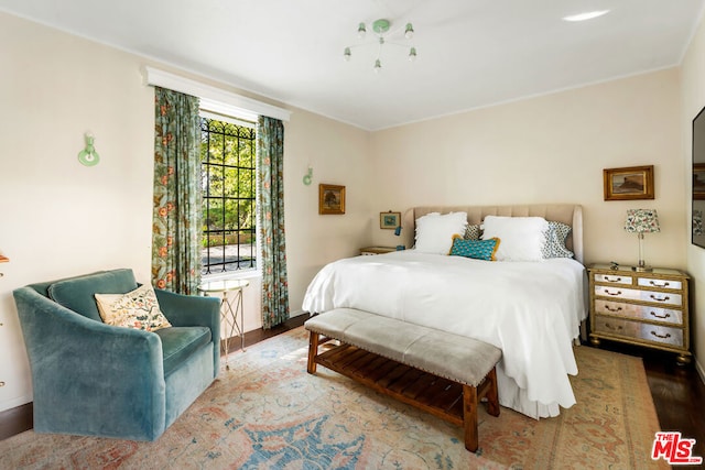 bedroom featuring wood-type flooring