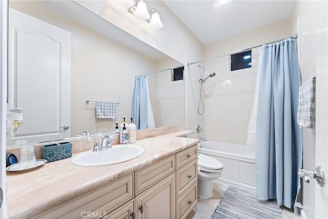 full bathroom with tile patterned flooring, shower / bath combo, toilet, and vanity