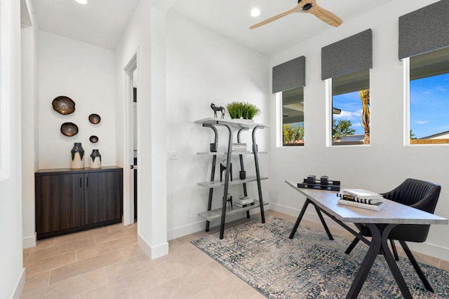 office featuring ceiling fan and plenty of natural light