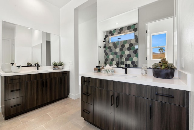 bathroom featuring vanity, walk in shower, and tile patterned flooring