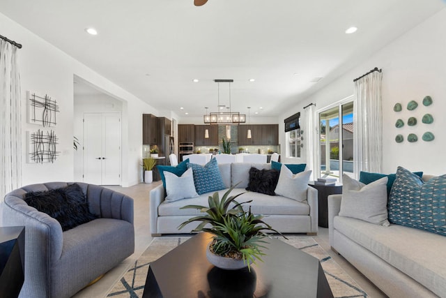 living room featuring a chandelier