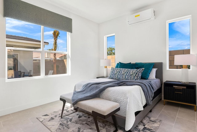 tiled bedroom featuring a wall mounted AC