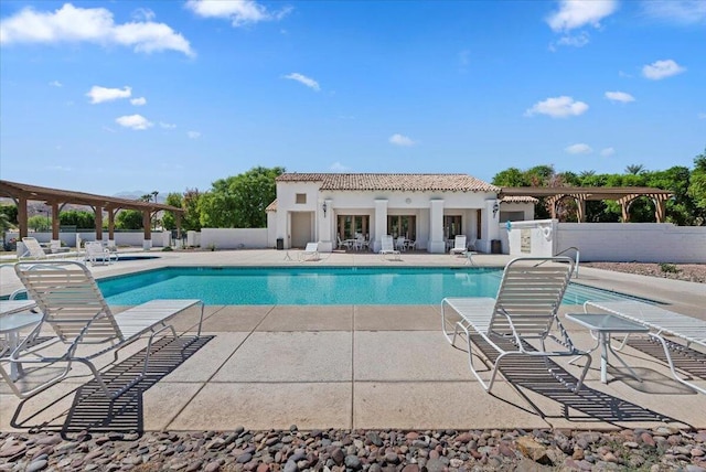 view of swimming pool with a patio