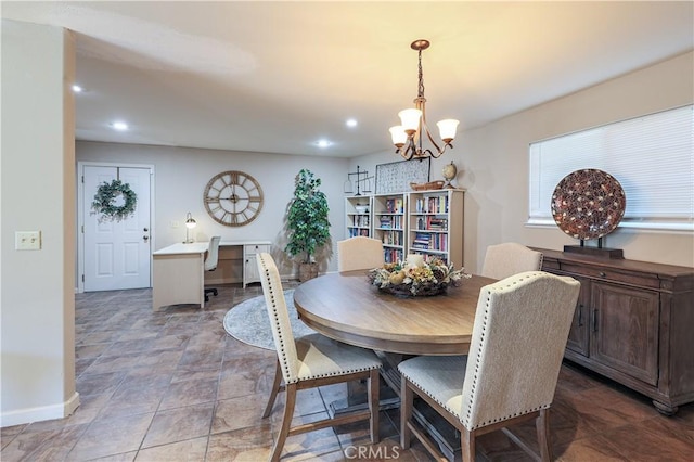 dining room with a chandelier