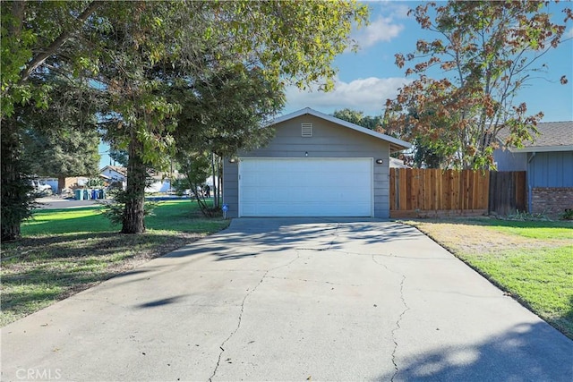 garage with a lawn