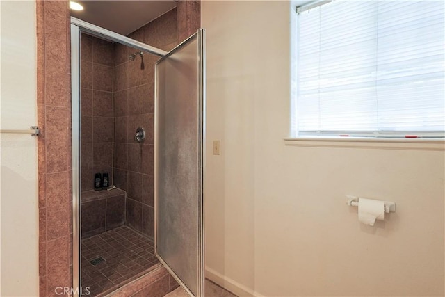 bathroom featuring walk in shower