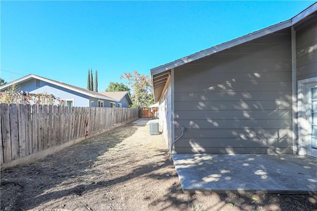 view of property exterior with central AC unit