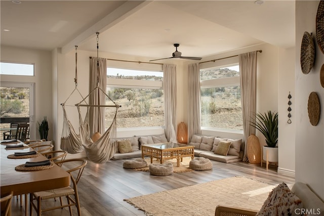 sitting room featuring hardwood / wood-style flooring and ceiling fan