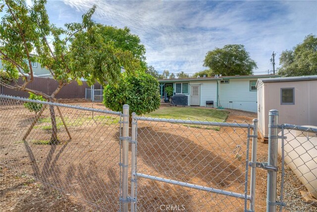 ranch-style house with a front lawn