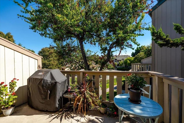 wooden deck featuring area for grilling