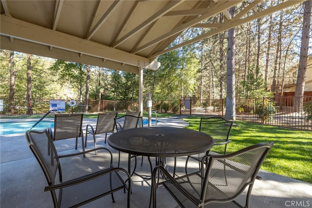 view of patio / terrace featuring a community pool