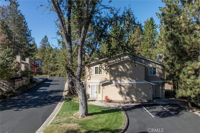 view of front of property with a front lawn