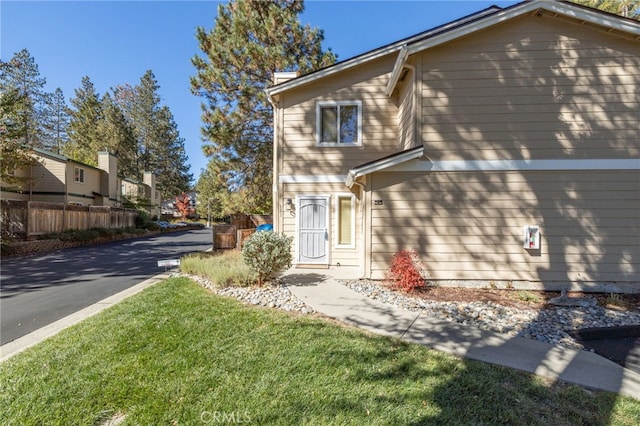 exterior space with a front yard