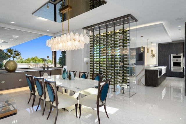 dining space with a notable chandelier