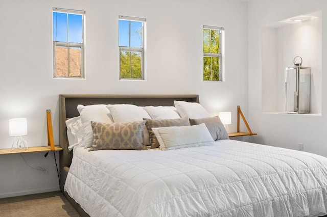 bedroom featuring hardwood / wood-style floors