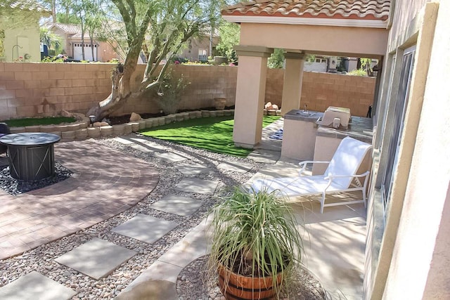 view of patio with area for grilling