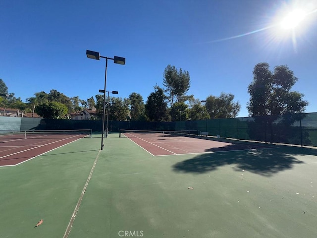 view of sport court featuring basketball court