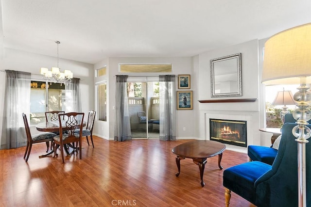 interior space featuring hardwood / wood-style flooring and a notable chandelier