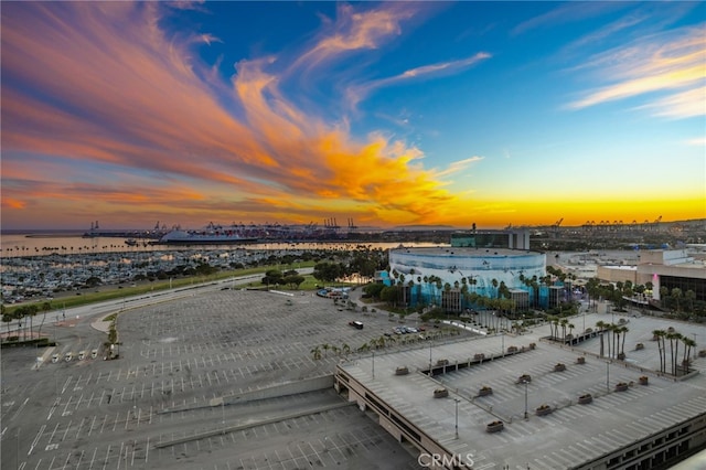 aerial view at dusk with a water view