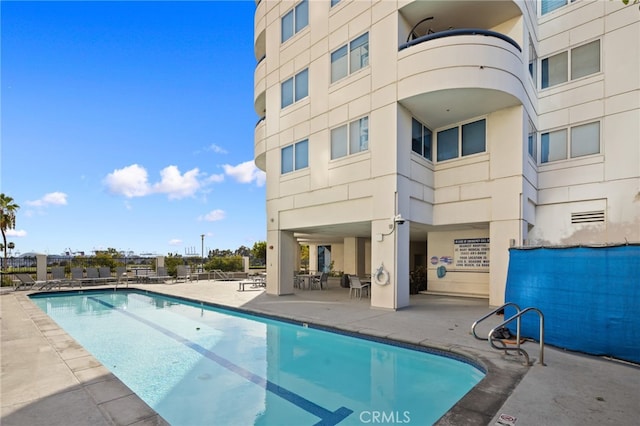 view of pool with a patio