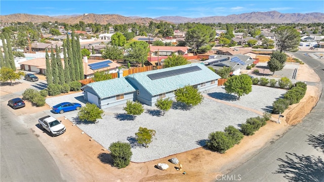 drone / aerial view featuring a mountain view